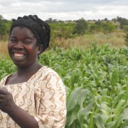 Sara Maunda checks her cell phone for pricing information. 