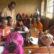 Kenyan pastoralists learn about livestock insurance.