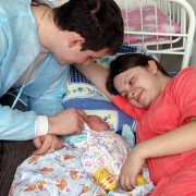 Natalia and Alexei Voinerovsky are enjoying the company of their newborn son in a postpartum ward of the Oblast Hospital