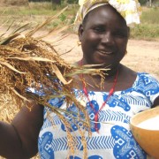 Coumbayel Coulibaly displays the fruits of the harvest.