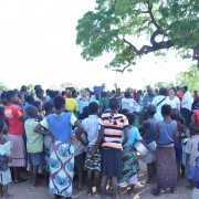 Villagers celebrate a share out.