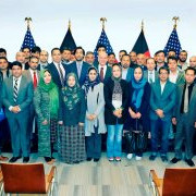 U.S. Ambassador to Afghanistan, P. Michael McKinley, honors 34 Afghan small and medium enterprises.