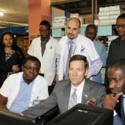 U.S. Ambassador Thomas Daughton and the Minister for Health and Social Services, Dr. Bernard Haufiku, test the new web-based com