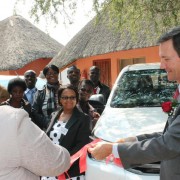 USAID hands over 4 double-cab vehicles to various health districts.