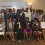 USAID Haiti Mission Director Jene Thomas with representatives from local civil society organizations and businesses.