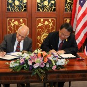 USAID Asia Mission Director Michael Yates and Thailand International Development Cooperation Director-General Piroon Laismit sig