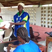 Child and mother receive a bednet