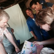 Senior DAA Wade Warren meets with community health workers in southwestern Madagascar