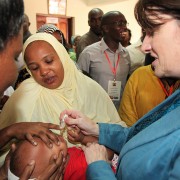 A child receives an oral polio vaccination.