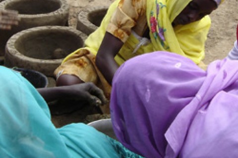 Women make fuel-efficient stoves in Mukjar camp in West Darfur.